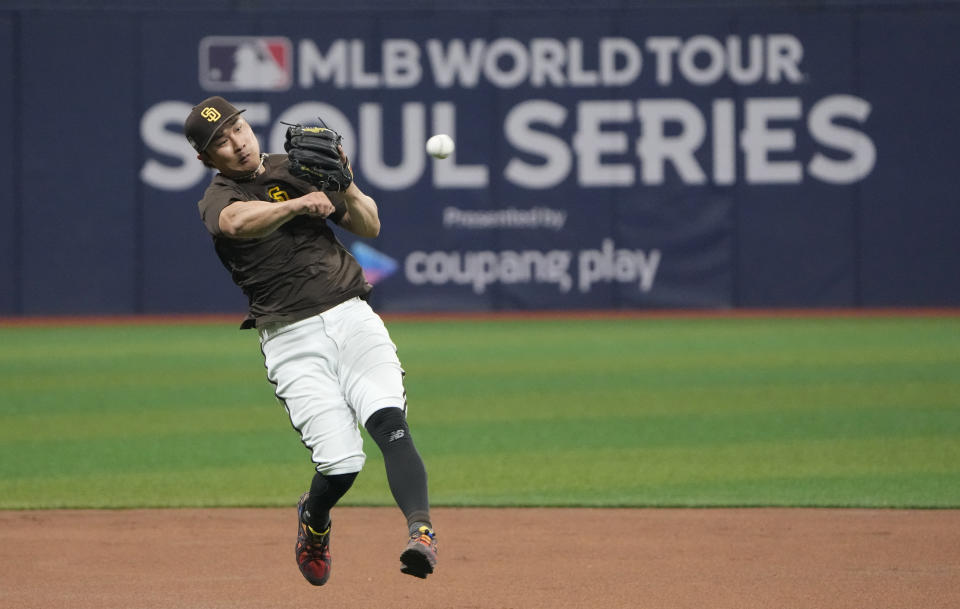 San Diego Padres' Ha-Seong Kim attends a baseball workout at the Gocheok Sky Dome in Seoul, South Korea, Tuesday, March 19, 2024. (AP Photo/Ahn Young-joon)