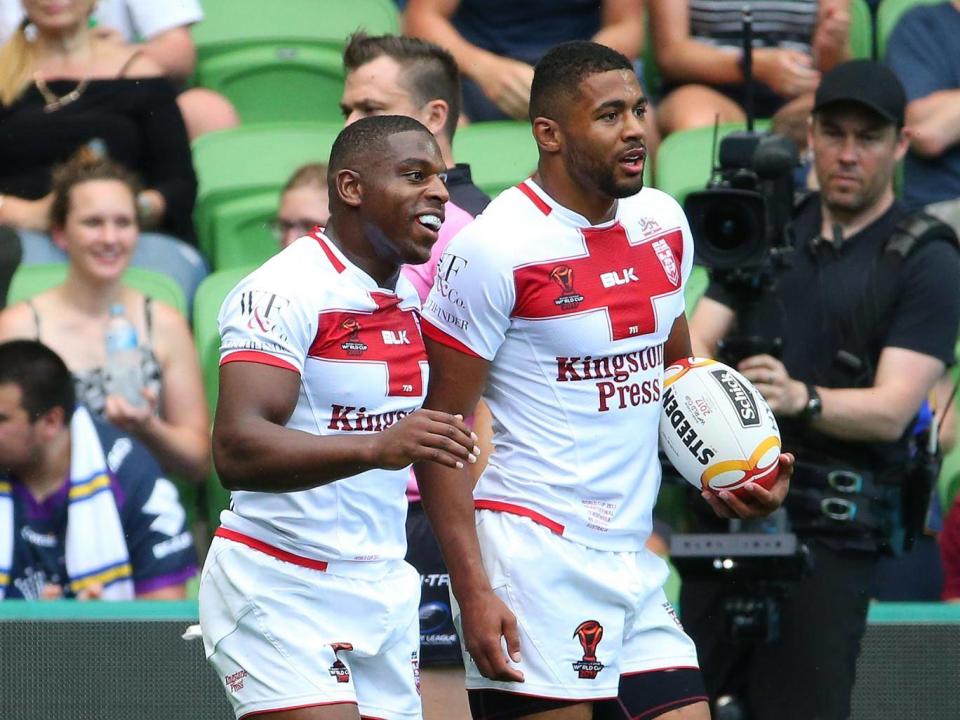McGillvary celebrates with Kallum Watkins after the latter scored a try (Getty)