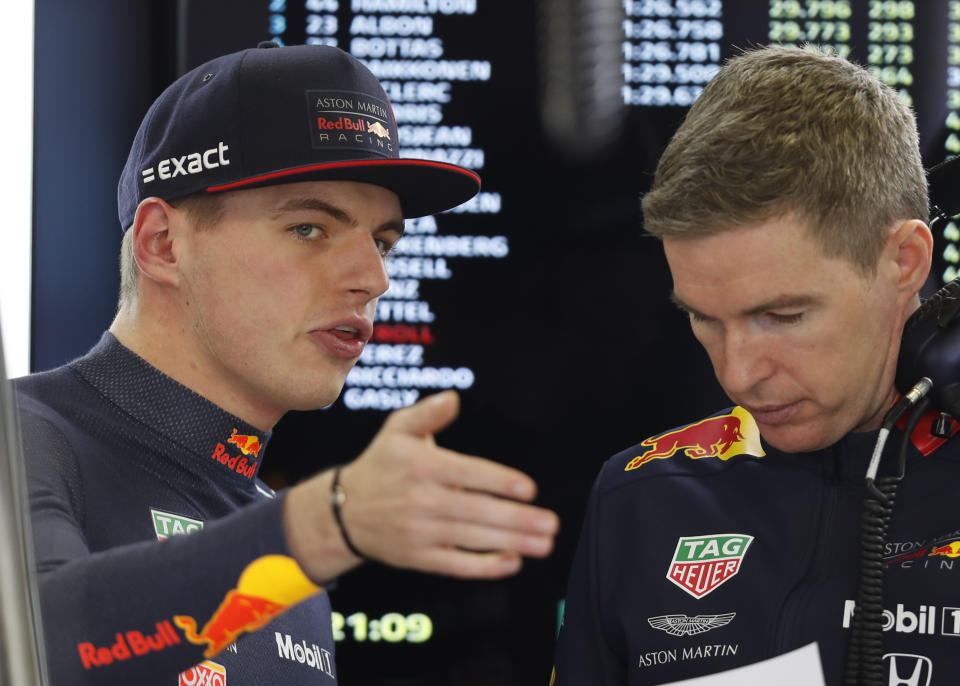 Red Bull driver Max Verstappen, of the Netherlands, talks to a member of his team during the final practice session for the Formula One Mexico Grand Prix auto race at the Hermanos Rodriguez racetrack in Mexico City, Saturday, Oct. 26, 2019. (AP Photo/Eduardo Verdugo)