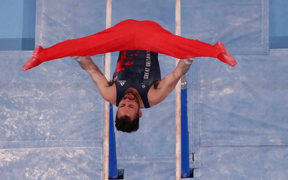 James Hall on the parallel bars - REUTERS