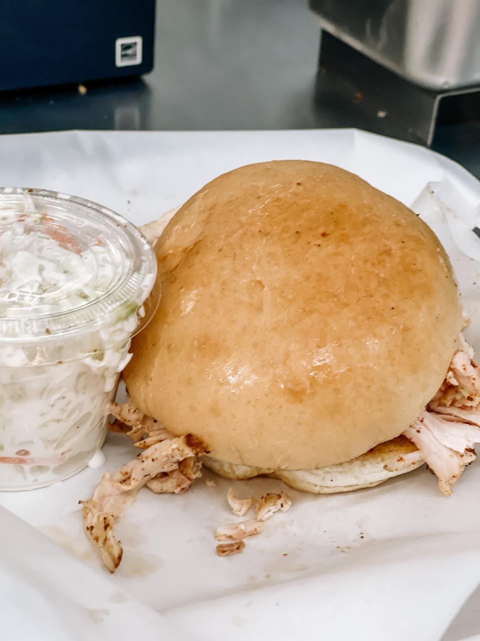 Archer’s BBQ pulled chicken sandwich with a side of coleslaw.