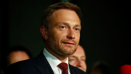 Chairman of the Free Democratic Party (FDP) Christian Lindner leaves the German Parliamentary Society after exploratory talks about forming a new coalition government in Berlin, Germany, November 17, 2017. REUTERS/Hannibal Hanschke