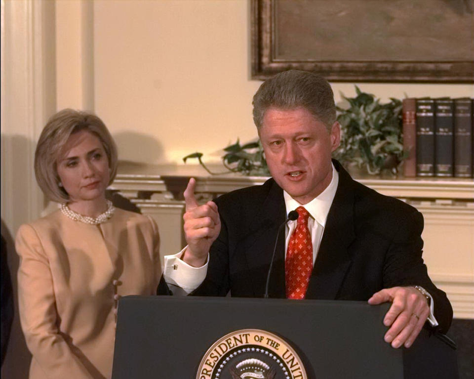 President Bill Clinton shakes his finger as he denies improper behavior with Monica Lewinsky, in the White House Roosevelt Room. 