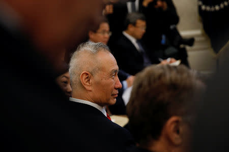 China's Vice Premier Liu He listens during a meeting with U.S. President Donald Trump in the Oval Office at the White House in Washington, U.S., February 22, 2019. REUTERS/Carlos Barria