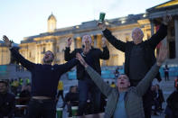 England supporters react in the fan zone in Trafalgar Square in London, Tuesday, June 22, 2021 during the Euro 2020 soccer championship group D match between England and the Czech Republic at Wembley Stadium. (AP Photo/Alberto Pezzali)