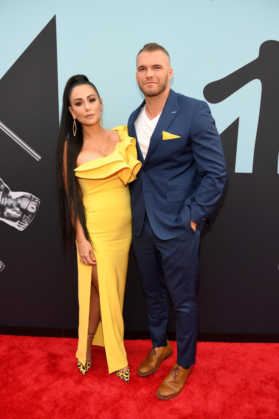 <h1 class="title">JWoww and Clayton Carpinello</h1><cite class="credit">Photo: Getty Images</cite>