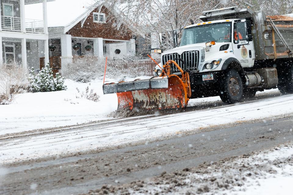 A plow plows a road in Salt Lake City on Thursday, Jan. 11, 2024. Overnight snow blanketed the Wasatch Front. | Megan Nielsen, Deseret News