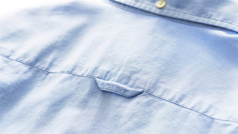 Here’s the reason why men’s shirts have a tiny loop on the back