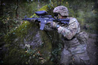 US army soldiers of 2nd Brigade of the 11th Airborne Division take position to fire during Jungle lane terrain exercise at the Indo-US joint exercise or "Yudh Abhyas, in Auli, in the Indian state of Uttarakhand, Tuesday, Nov. 29, 2022. India’s defence ministry statement said the joint exercise is conducted annually with the aim of exchanging best practices, tactics, techniques and procedures between the armies of the two nations. The training schedule focuses on employment of an integrated battle group under Chapter VII of the UN Mandate. The schedule will include all operations related to peace keeping & peace enforcement. (AP Photo/Manish Swarup)