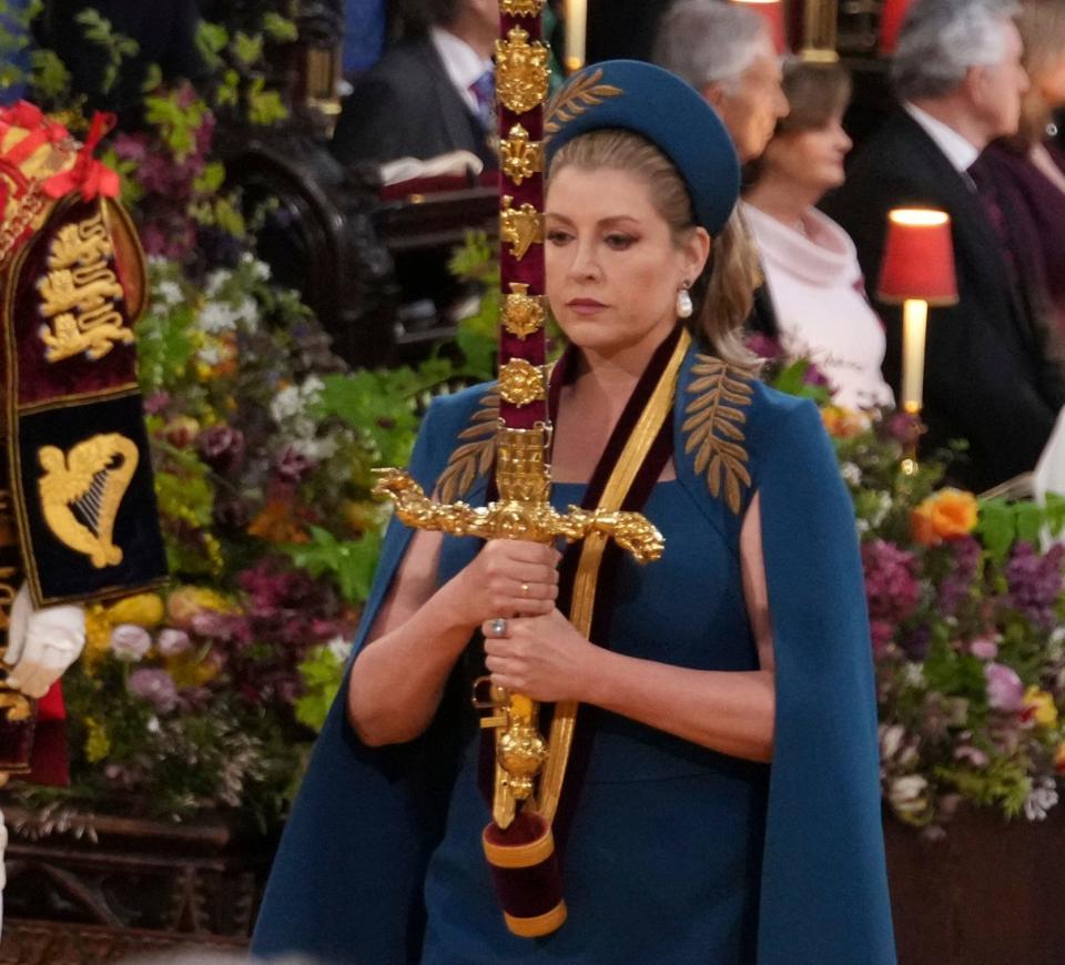 Penny Mordaunt wore Safiyaa to carry the Sword of State at the Coronation in May