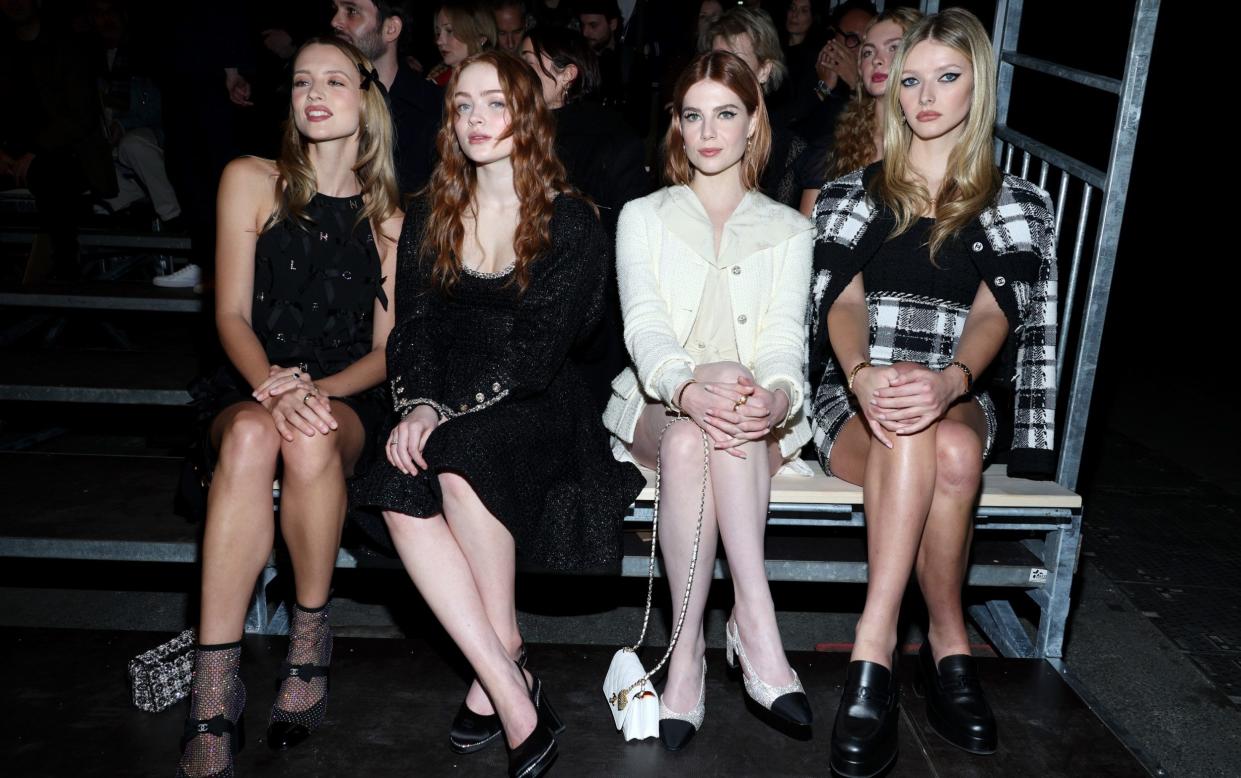 (L-R) AngÃ¨le, Sadie Sink, Lucy Boynton, and Apple Martin attend the Chanel Haute Couture Spring Summer 2023 show as part of Paris Fashion Week - Getty Images Europe