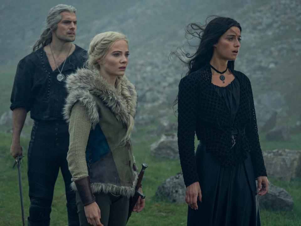 Henry Cavill, Freya Allan and Anya Chalotra in "The Witcher" season three.