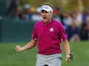 Team Europe golfer Ian Poulter of England reacts to sinking a birdie putt on the 16th green to win the hole during the afternoon four-ball round at the 39th Ryder Cup golf matches at the Medinah Country Club in Medinah, Illinois September 29, 2012. REUTERS/Mike Blake (UNITED STATES - Tags: SPORT GOLF) 