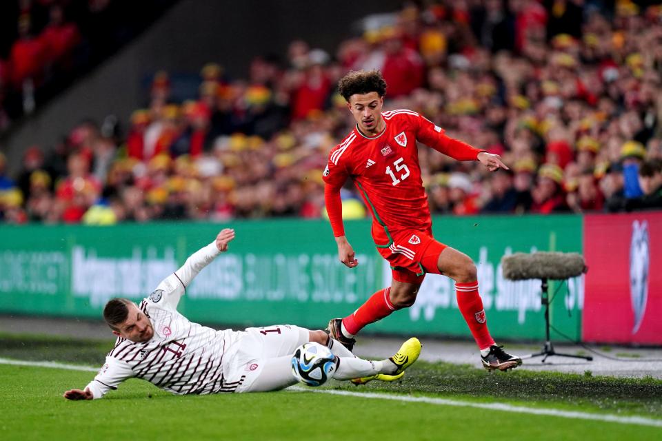 Ethan Ampadu (right) battles for possession with Latvia’s Roberts Savalnieks in Wales’ Euro 2024 qualifying win in Cardiff (David Davies/PA) (PA Wire)