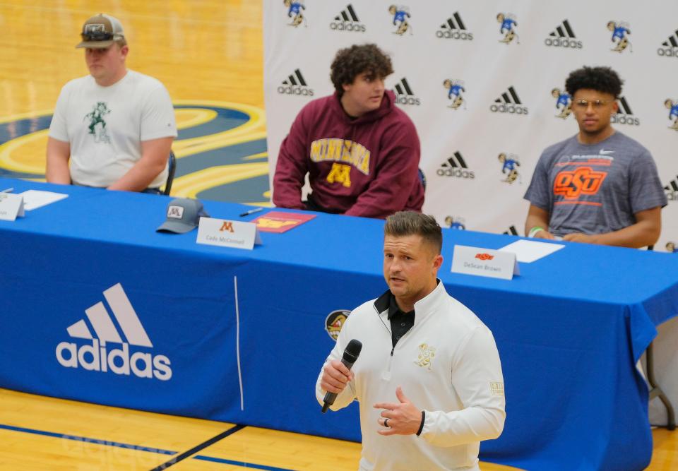 Choctaw coach Jake Corbin talks about his players, Alton Robinson, Missouri State, Cade McConnell, Minnesota, and DeSean Brown, OSU at Choctaw High School, sign letters of intent on national signing day, Wednesday, December 15, 2021. 