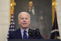 President Joe Biden speaks in the State Dining Room of the White House, Saturday, March 6, 2021, in Washington. The Senate approved a sweeping pandemic relief package over Republican opposition on Saturday, moving Biden closer to a milestone political victory that would provide $1,400 checks for most American and direct billions of dollars to schools, state and local governments, and businesses. (AP Photo/Alex Brandon)