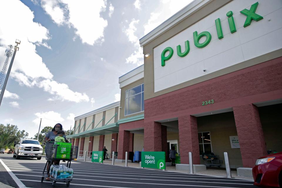 Shoppers exit the new Publix in Crawfordville, Fla. on its opening day on Thursday, Aug. 4, 2022. 