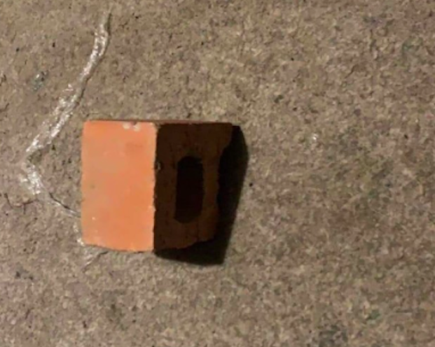 A brick was found inside the home following the incident. (Reach)
