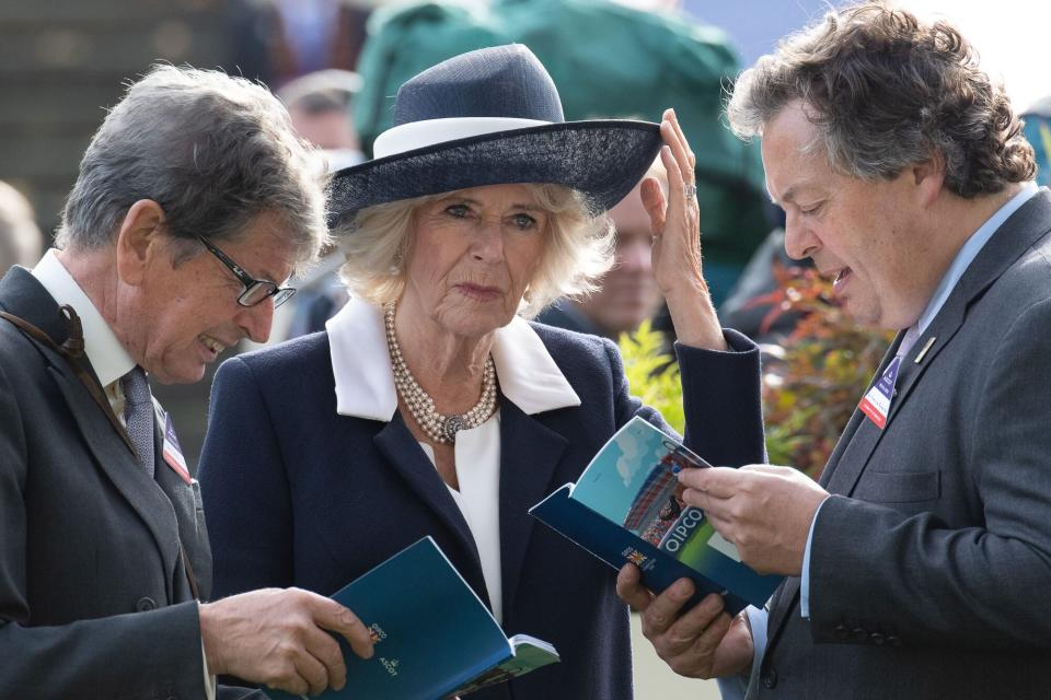Mandatory Credit: Photo by Maureen McLean/Shutterstock (13467586m) Camilla, Queen Consort watches the horses in the Parade Ring at the QIPCO British Champions Day at Ascot Racecourse together with Sir John Warren Sir Francis Brooke, His Majesty's Representative Camilla, Queen Consort, QIPCO British Champions Day, Ascot, Berkshire, UK - 15 Oct 2022