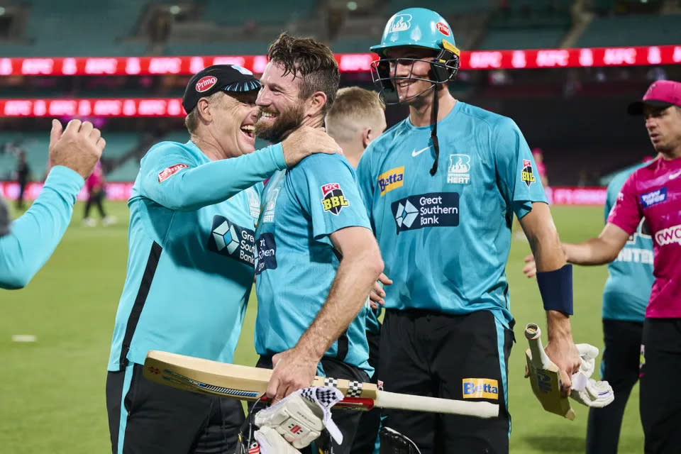 Pictured centre, Brisbane Heat's Michael Neser celebrates with his teammates after starring in the BBL finals win against the Sydney Sixers.