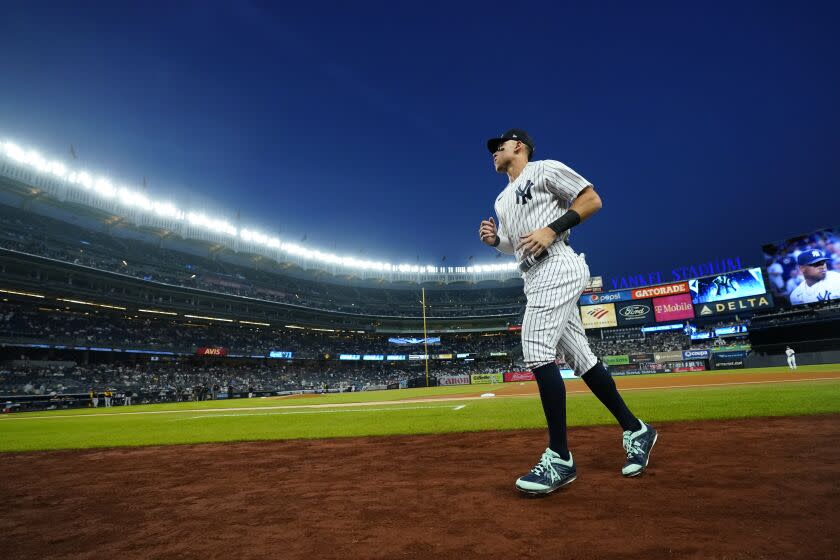 New York Yankees' Aaron Judge runs on the field before a baseball game against the Pittsburgh Pirates Wednesday, Sept. 21, 2022, in New York. (AP Photo/Frank Franklin II)