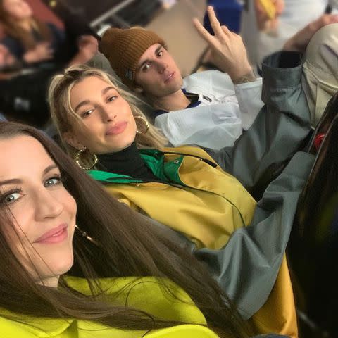 <p>Pattie Mallette Instagram</p> Pattie Mallette, Hailey Bieber and Justin Bieber at a hockey game in March 2020