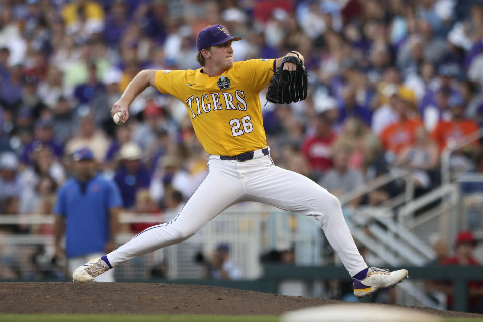 FILE - LSU pitcher Thatcher Hurd (26) throws in the sixth inning of Game 3 of the NCAA College World Series baseball finals against Florida in Omaha, Neb., Monday, June 26, 2023. Hurd is coming off a terrific postseason and goes into the season as the Tigers' Friday night starter. (AP Photo/Rebecca S. Gratz, File)