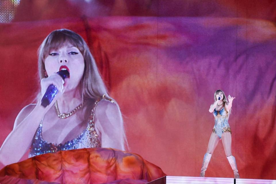 Swift performing during her Eras Tour (AFP via Getty Images)