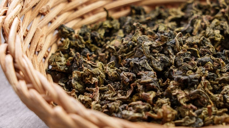 Basket of dried gunpowder tea leaves