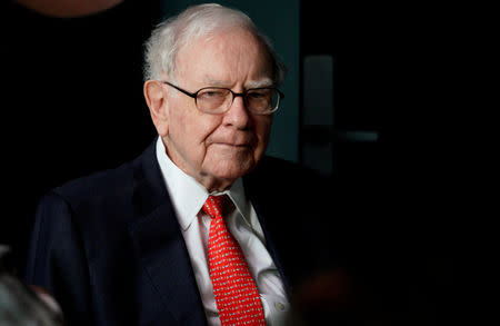 FILE PHOTO: Warren Buffett, CEO of Berkshire Hathaway Inc, pauses while playing bridge as part of the company annual meeting weekend in Omaha, Nebraska U.S. May 6, 2018. REUTERS/Rick Wilking/File Photo