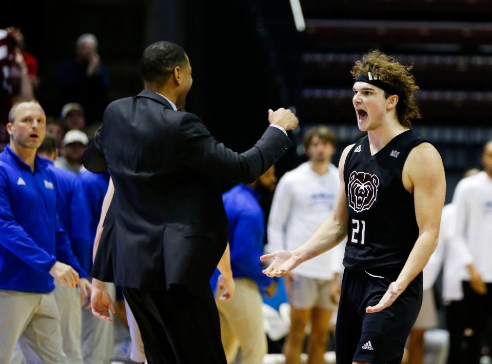 Missouri State freshman Nick Kramer celebrates with coach Dana Ford after Kramer hit a basket to send the game into overtime against the Drake Bulldogs at Great Southern Bank Arena on Wednesday, Jan. 24, 2024.