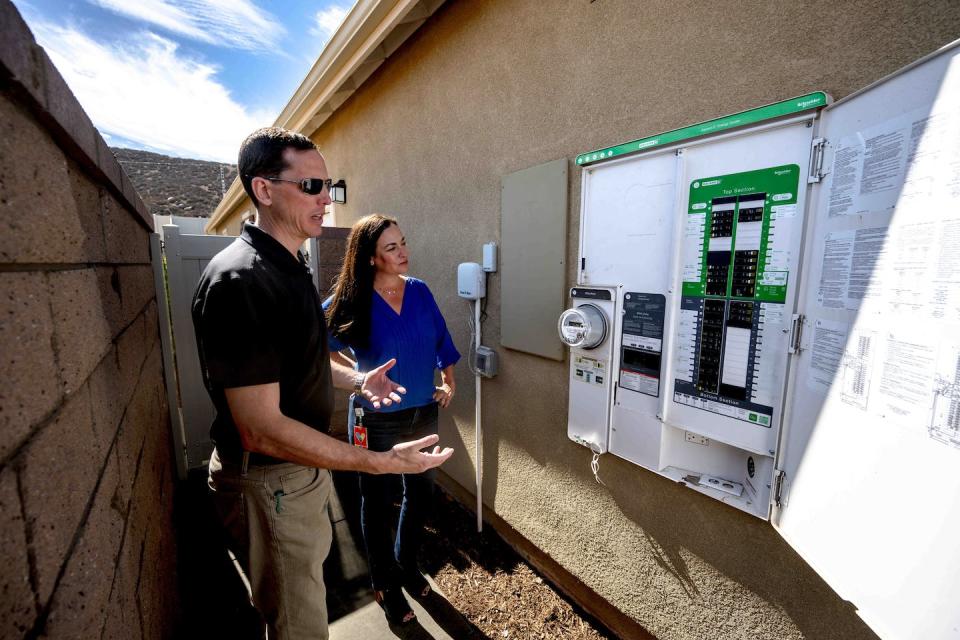 Two microgrid communities being developed in Menifee, Calif., feature all-electric homes equipped with solar panels, heat pumps and batteries. <a href="https://www.gettyimages.com/detail/news-photo/scott-hensen-vice-president-of-floor-planning-for-kb-home-news-photo/1244678088" rel="nofollow noopener" target="_blank" data-ylk="slk:Watchara Phomicinda/MediaNews Group/The Press-Enterprise via Getty Images;elm:context_link;itc:0;sec:content-canvas" class="link ">Watchara Phomicinda/MediaNews Group/The Press-Enterprise via Getty Images</a>