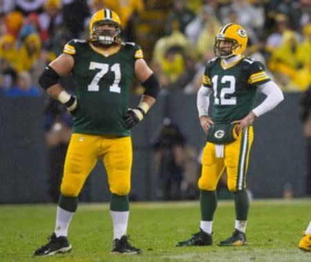 Green Bay Packers quarterback Aaron Rodgers (12) reacts after throwing an interception during the fourth quarter of a NFL game against the Chicago Bears on Thanksgiving at Lambeau Field. Jeff Hanisch-USA TODAY Sports