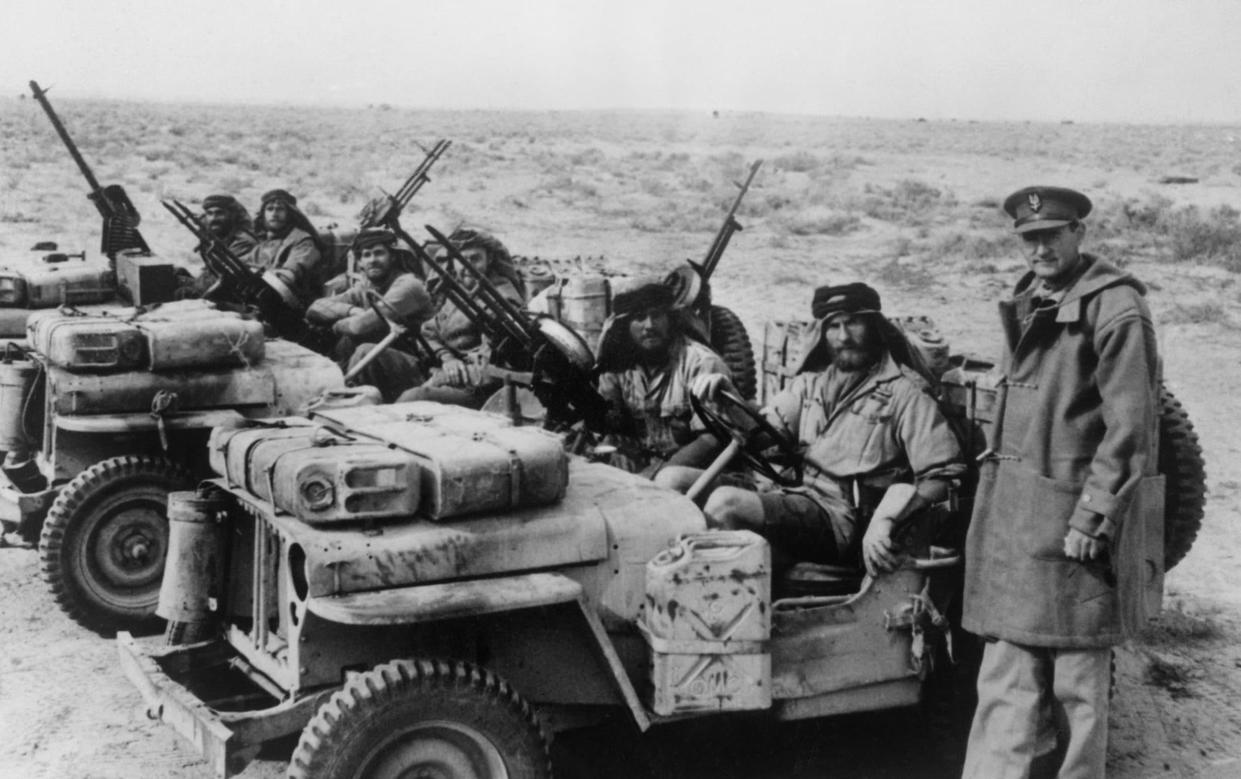 Colonel David Stirling greeting a jeep patrol in 1943 - Getty