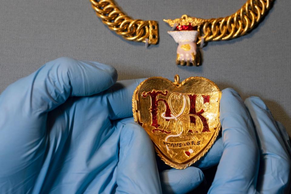 london, england january 31 a gold pendant is displayed during a photocall at the british museum on january 31, 2023 in london, england the british museum launches its 2021 portable antiquities scheme pas treasure annual reports today on show were some of the 45,000 treasures reported in 2021 including a tudor jewel, a chain with a pendant, associated with henry viii and his first wife, katherine of aragon, m1509 33 the heart shaped pendant was found by a metal detectorist in warwickshire photo by dan kitwoodgetty images