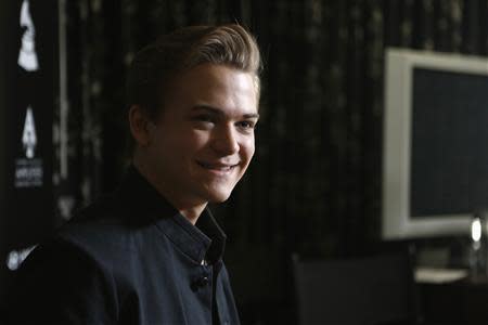 Country music singer Hunter Hayes poses during a media opportunity in Beverly Hills, California January 23, 2014. REUTERS/Mario Anzuoni