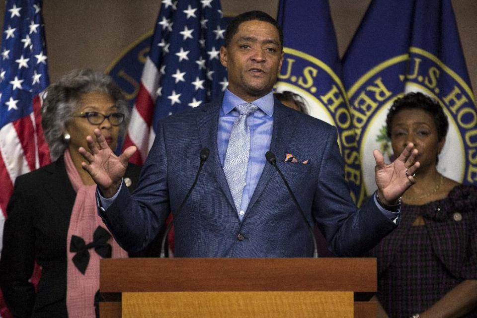 File- This Jan. 5, 2017, file photo shows Congressional Black Caucus Chairman Rep. Cedric Richmond, D-La. speaking during a news conference on Capitol Hill in Washington. The Congressional Black Caucus plans to push President Donald Trump on the changing priorities of the Justice Department’s monitoring of police departments and cuts in education funding for college students in their Oval Office meeting, and say they won’t let their meeting turn into a publicity opportunity for a president deeply unpopular with their constituency. The Congressional Black Caucus’ leadership will meet with Trump on Wednesday, March 22, 2017, at the White House, and chairman Richmond said they plan to press Trump on several areas of interest to African-American voters. (AP Photo/Zach Gibson, File)