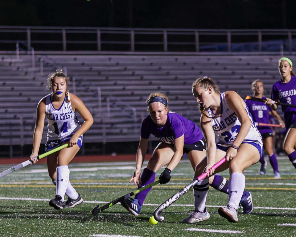 Danielle Schroll (23) tries to move the ball as Lexi Kresge (6) defends. The Cedar Crest Falcons played host to the Ephrata Mounts in a LL League Field Hockey game Tuesday, October 3, 2023. The Mounts defeated the Falcons 3-1.