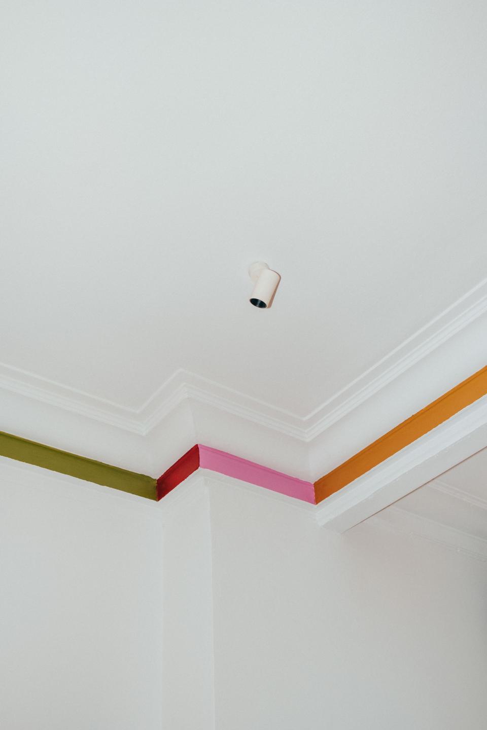 Painted moldings create visual intrigue in an otherwise forgotten area.