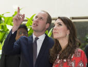 <p>Kate accessorised with a pair of £1,495 gold statement earrings by Cassandra Goad and wore her hair in loose - but perfect - curls.  <i>[Photo: Rex]</i></p>