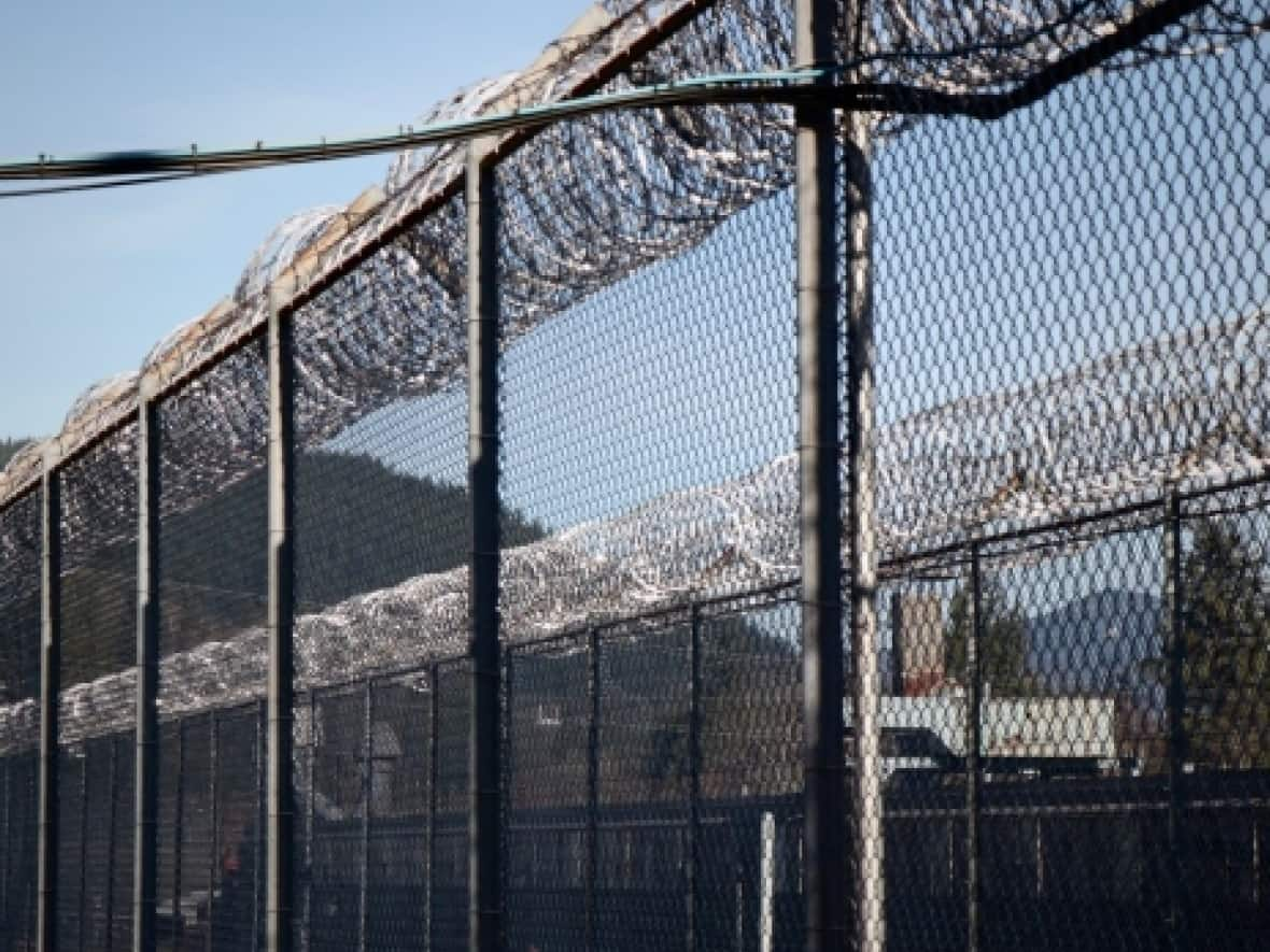 A lockdown was ordered at the Mission Institution, a medium-security prison, on Thursday night. The Union of Correctional Officers says a drone was dropped delivering what is suspected to be a firearm. (Raferty Baker/CBC - image credit)