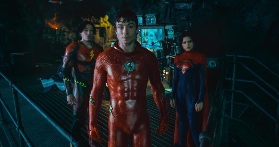Barry Allen (Ezra Miller, center) gets help in his efforts to fix a time-travel mistake from his teenage self (also Miller) and Supergirl (Sasha Calle) in "The Flash."