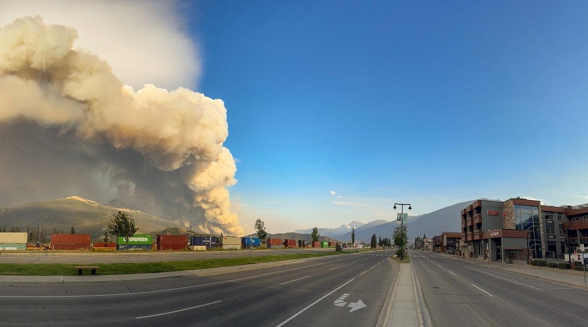 Smoke rises as wildfires continue growing in Jasper National Park, Alberta, Canada on July 24, 2024. / Credit: JASPER NATIONAL PARK /HANDOUT/Anadolu via Getty Images