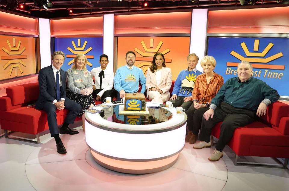 From left: Charlie Stayt, Carol Kirkwood, Naga Munchetty, Jon Kay, Sally Nugent, Francis Wilson, Debbie Rix and Russell Grant on the red sofa as BBC Breakfast celebrate its 40th anniversary with a special show and guests at MediaCityUK, Salford (Danny Lawson/PA)
