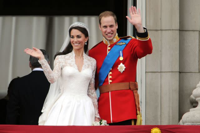 <p>Stephane Cardinale/Corbis via Gett</p> Kate Middleton and Prince William on the balcony at Buckingham Palace after their wedding in 2011.