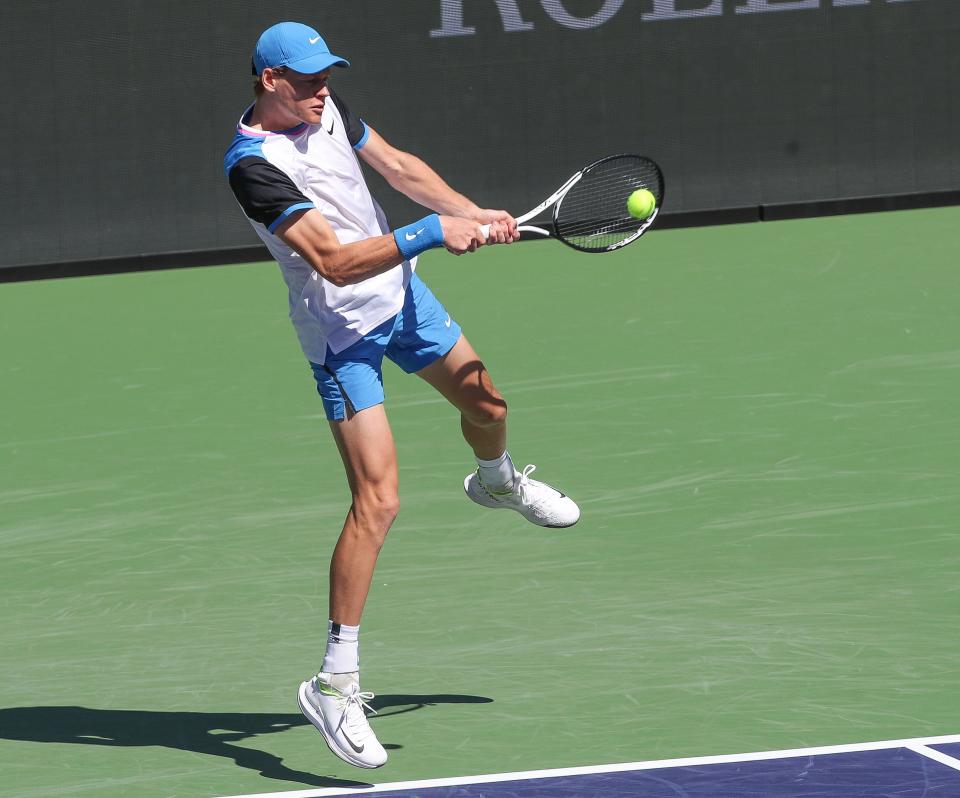 Jannik Sinner hits a shot during his match against Thanasi Kokkinakis during the BNP Paribas Open in Indian Wells, Calif., March 8, 2024.