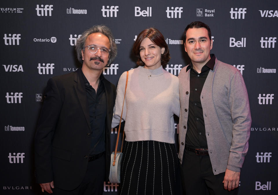 TORONTO, ONTARIO - SEPTEMBER 08: (L-R) Farhad Delaram, Homa Hasani, and Merhdad Jafari Raad attend the 