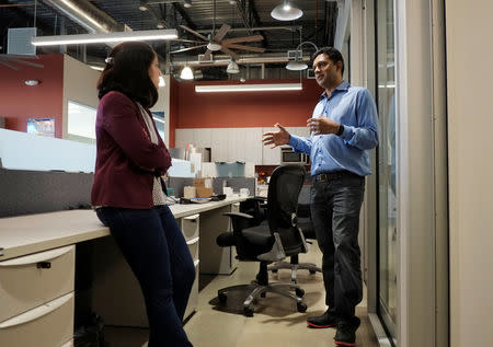 Guru Hariharan, the CEO of startup Boomerang Commerce, discusses business issues with president of finance Jaya Jaware at the company's headquarters in Mountain View, California, U.S. April 21, 2017. REUTERS/Stephen Nellis