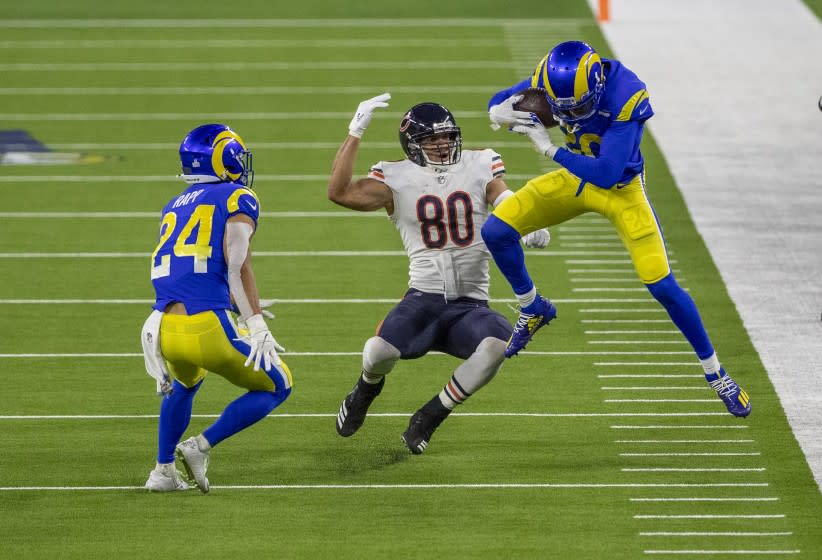 INGLEWOOD, CA - OCTOBER 26, 2020: Los Angeles Rams cornerback Jalen Ramsey (20) intercepts a pass intended for Chicago Bears tight end Jimmy Graham (80) in the 4th quarter at So-Fi Stadium on October 26, 2020 in Inglewood, California. (Gina Ferazzi / Los Angeles Times)