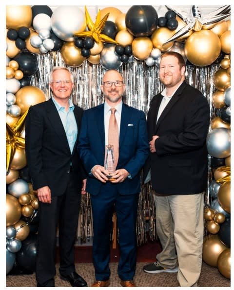 Clearwave Fiber representatives were proud to accept the Regional Business of the Year Award from the Carbondale Chamber of Commerce. Pictured from left: Account Executive Chris Ahart, Strategic Account Representative Robert Tolnai, and Municipal Relations Manager Nathan Columbo. PHOTO CREDIT: Prescott Doll, Designs by Prescott